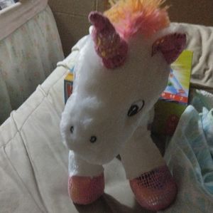Unicorn squeaky plush animal